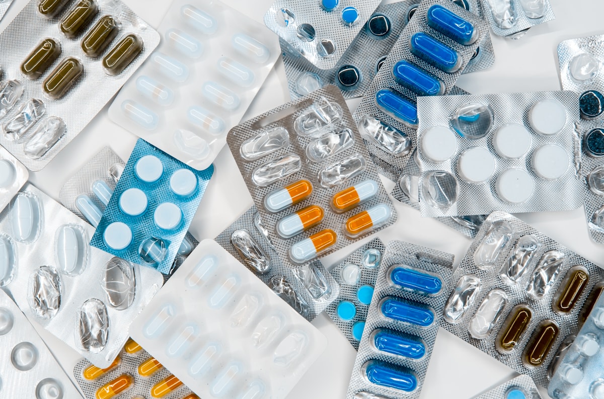 Four people inside a pharmacy